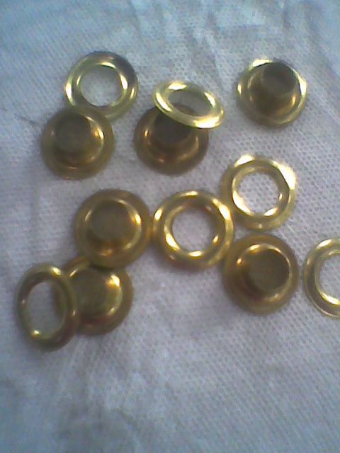 Grommets sm 1/2  brass  bottom and top ring is set  purchase is 12 