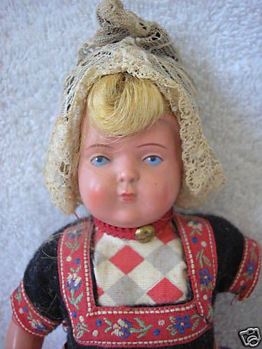 Antique celluloid doll. Swiss or Holland   Blue eyes  