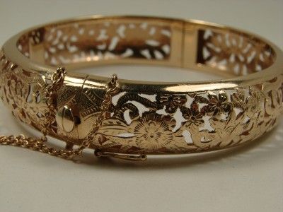 14KT GOLD MINGS HAWAII BANGLE/BRACELET. 14MM WIDE. APPROX 5MM IN 